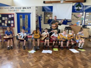 People playing guitars